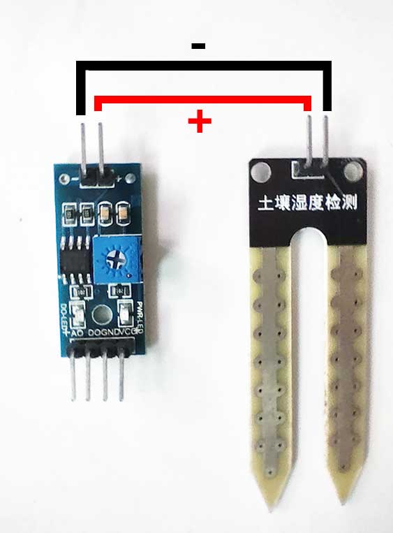 Connecting the soil moisture sensor module and the probe.